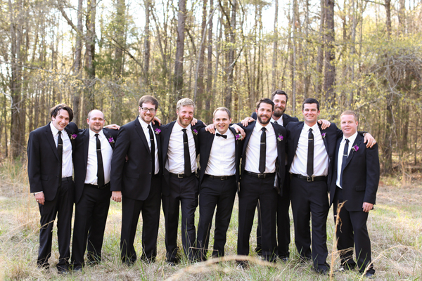 southern wedding groomsmen in black suits